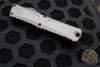 Microtech Combat Troodon Gen III OTF Knife- Double Edge- Natural Clear Finished Handle- Black Plain Edge Blade 1142-1 NC Gen III