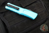 Microtech Combat Troodon Gen III OTF Knife- Double Edge- Turquoise Handle- Black Plain Edge Blade 1142-1 TQ Gen III
