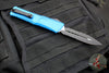 Microtech Combat Troodon Gen III OTF Knife- Double Edge- Blue Handle- Black Part Serrated Edge Blade 1142-2 BL Gen III