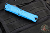 Microtech Combat Troodon Gen III OTF Knife- Double Edge- Blue Handle- Black Part Serrated Edge Blade 1142-2 BL Gen III
