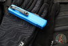 Microtech UTX-85 OTF Knife- GEN III- Double Edge- Blue Handle- Black Part Serrated Blade 1232-2 BL