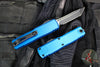 Microtech UTX-85 OTF Knife- GEN IV- Tanto Edge- Blue Handle- Black Finished Full Serrated Blade 12334-3 BL