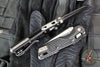 Microtech Knives- M.S.I. Ram-Lok Folder- MINI- Frag Pattern Black Finished Aluminum Handle- Black Plain Edge Blade 210M-1 FR