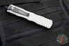 Microtech Dirac Delta OTF Knife- Double Edge- Titanium Gray Handle- Black Full Serrated Blade and Black HW 227-3 TG