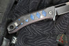 Half Face Blades- Kwaiken Folder/Flipper- Button Lock- Anodized Black Monolithic Aluminum Handle- Blue Camoquartz Inlay- Black Nitride S45VN Blade