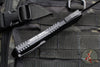Heretic Manticore-X OTF Auto- Double Edge- Tactical- Black Frag Pattern Handle- Two-Tone Black Full Serrated Blade- Black HW H032F-10C-T