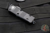 Microtech Mini Troodon OTF Knife- Double Edge- Black Tactical With Black Full Serrated Blade 238-3 T